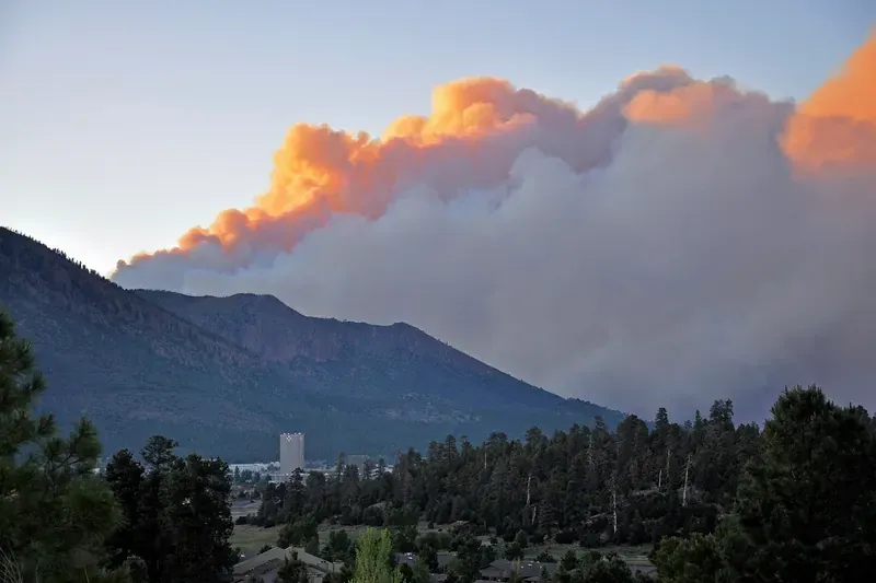 Smoke from the Schultz Fire rising over the mountains near Flagstaff