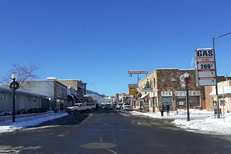 Downtown Williams, Arizona on Route 66 with snow along the street